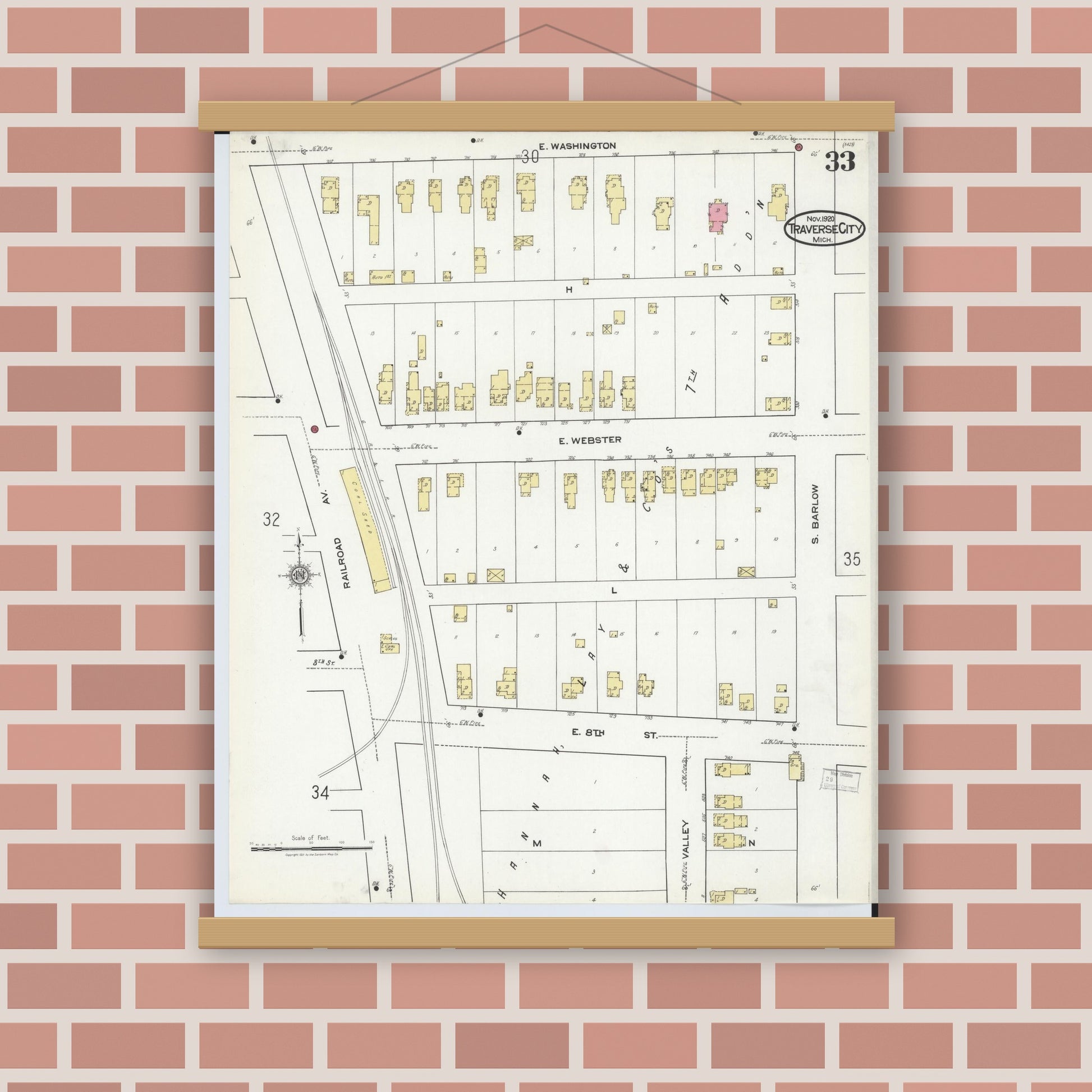 Old map wall art mockup — magnetic wood frame on brick wall — Sanborn Fire Insurance Map from Traverse City, Grand Traverse County, Michigan (1920), Sheet #0033