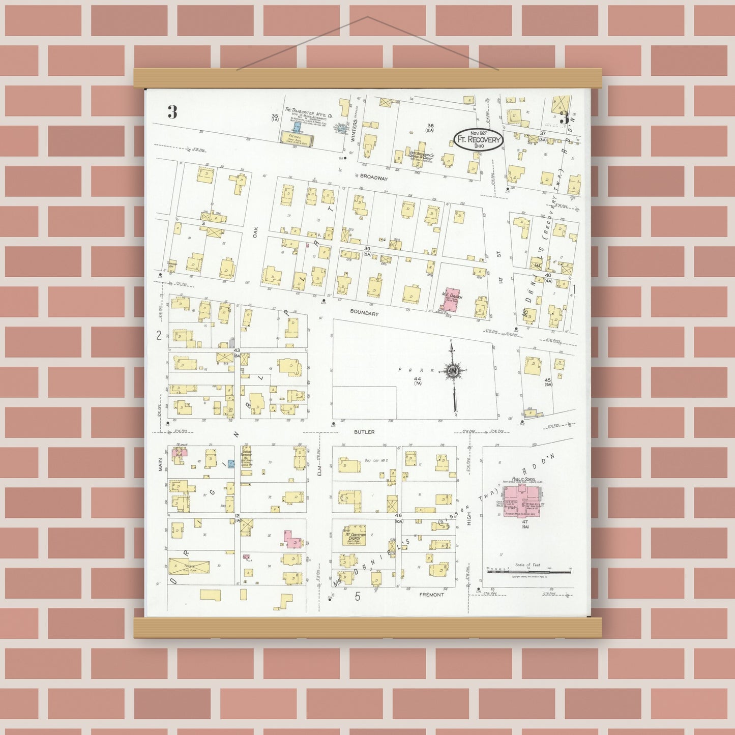 Old map wall art mockup — magnetic wood frame on brick wall — Sanborn Fire Insurance Map from Fort Recovery, Mercer County, Ohio (1927), Sheet #0003