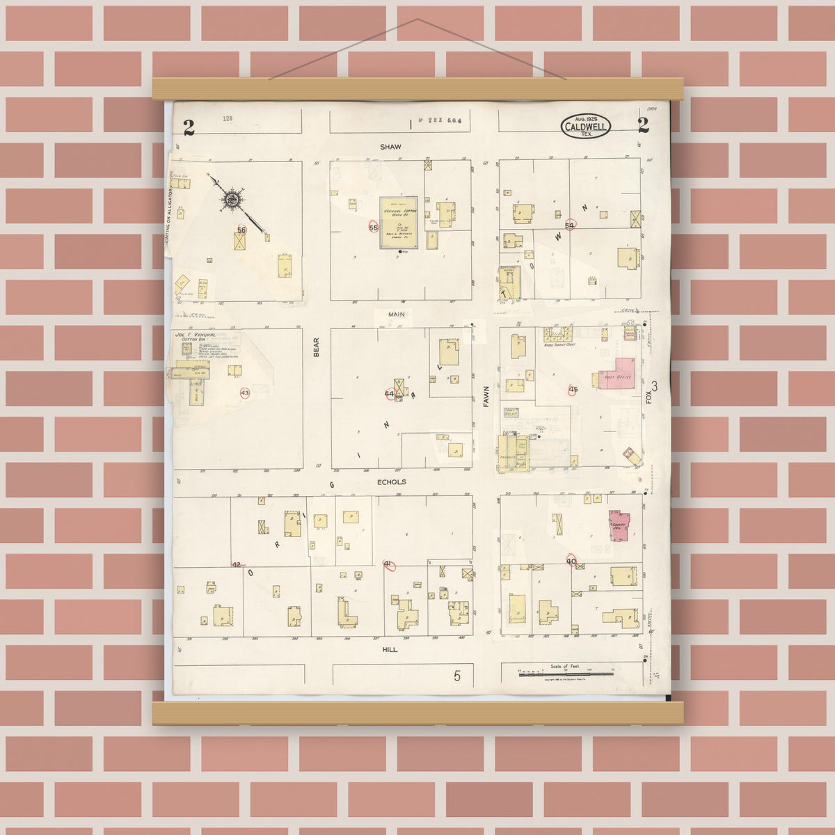 Old map wall art mockup — magnetic wood frame on brick wall — Sanborn Fire Insurance Map from Caldwell, Burleson County, Texas (1943), Sheet #0002