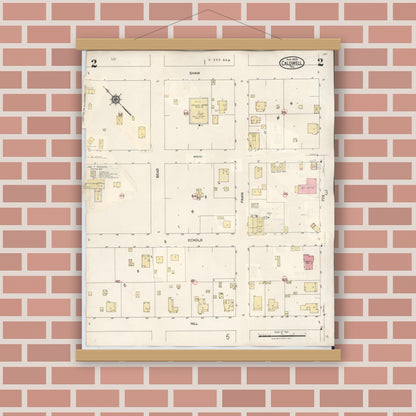 Old map wall art mockup — magnetic wood frame on brick wall — Sanborn Fire Insurance Map from Caldwell, Burleson County, Texas (1943), Sheet #0002