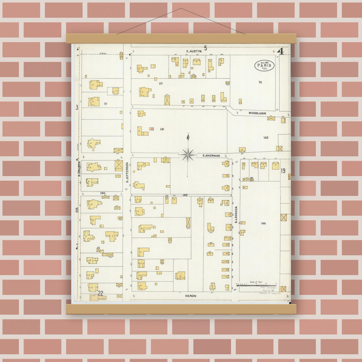 Old map wall art mockup — magnetic wood frame on brick wall — Sanborn Fire Insurance Map from Paris, Lamar County, Texas (1902), Sheet #0004
