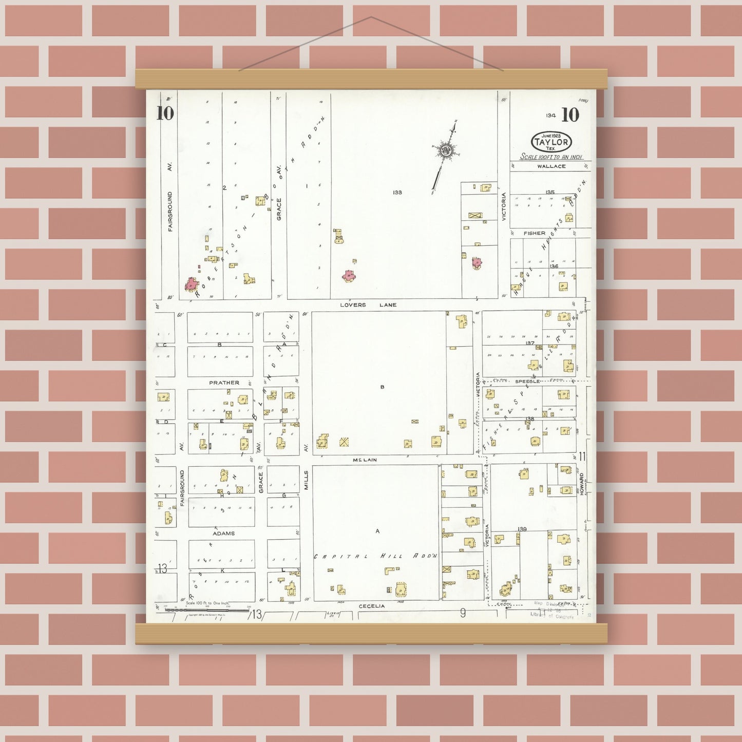 Old map wall art mockup — magnetic wood frame on brick wall — Sanborn Fire Insurance Map from Taylor, Williamson County, Texas (1923), Sheet #0010