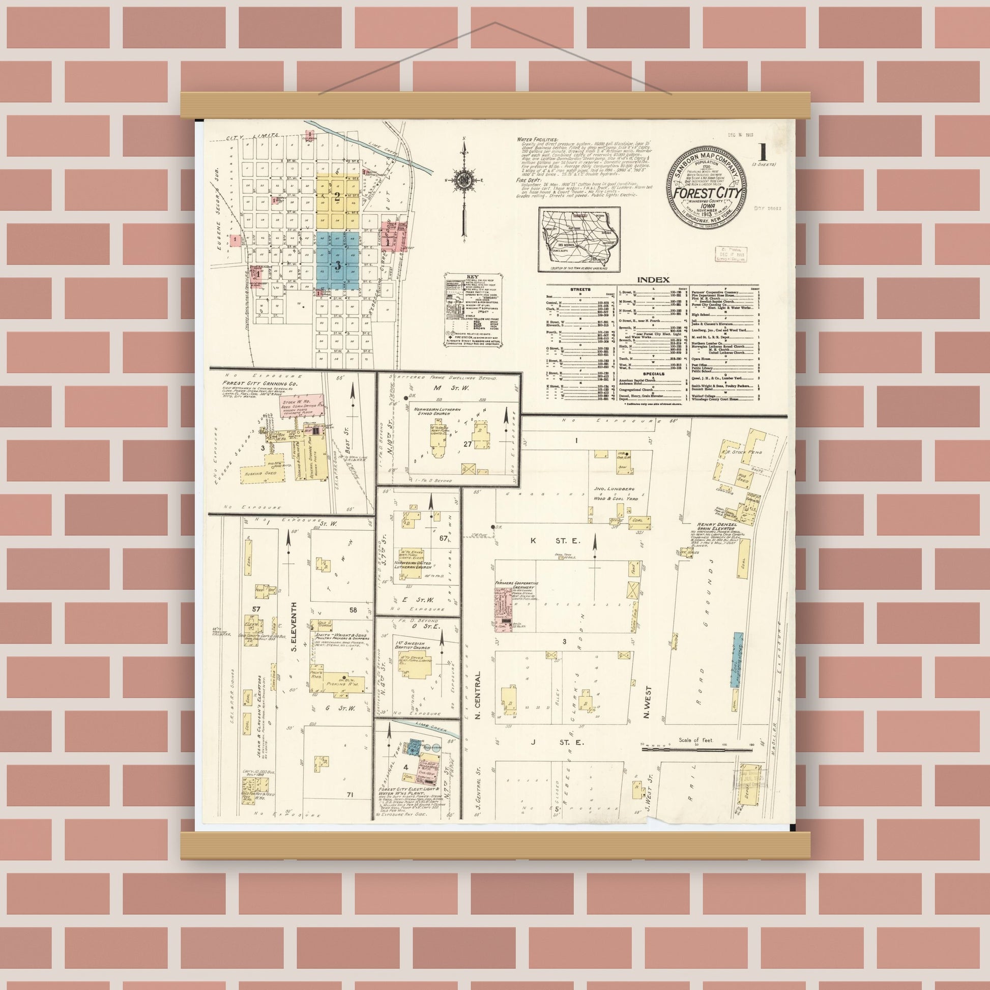 Old map wall art mockup — magnetic wood frame on brick wall — Sanborn Fire Insurance Map from Forest City, Winnebago County, Iowa (1913), Sheet #0001