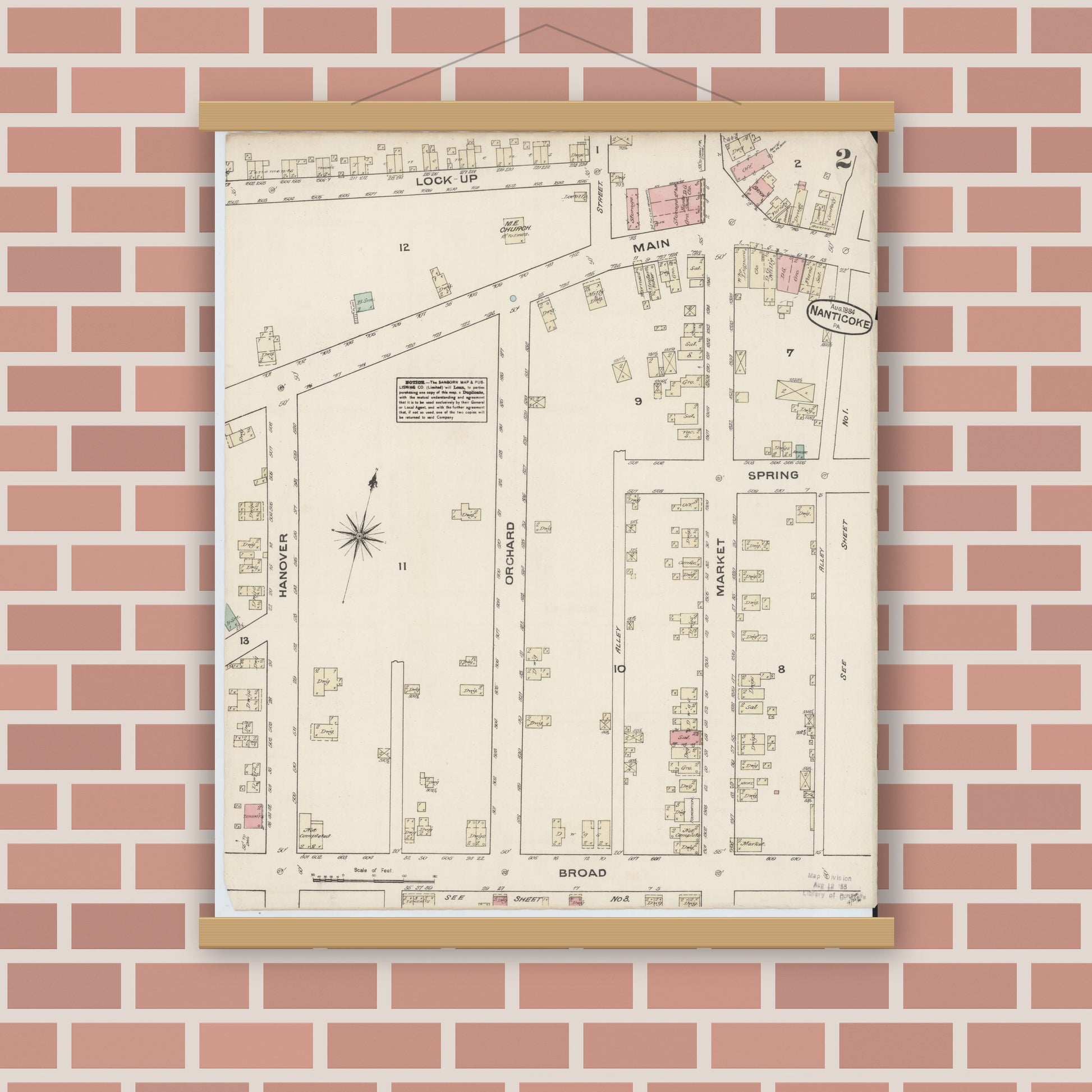 Old map wall art mockup — magnetic wood frame on brick wall — Sanborn Fire Insurance Map from Nanticoke, Luzerne County, Pennsylvania (1884), Sheet #0002