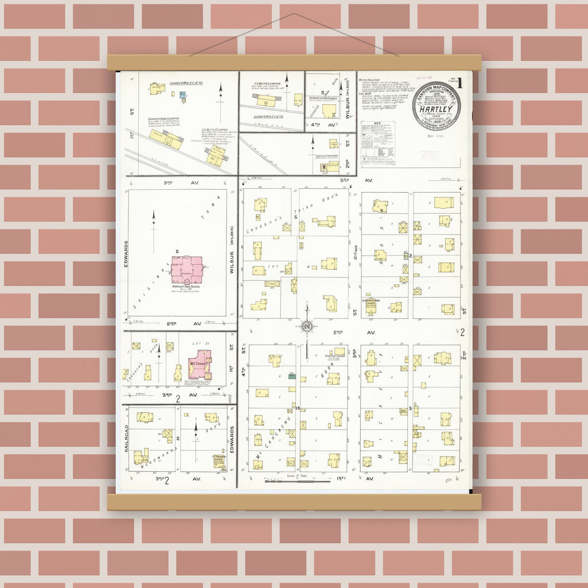 Old map wall art mockup — magnetic wood frame on brick wall — Sanborn Fire Insurance Map from Hartley, O'Brien County, Iowa (1909), Sheet #0001
