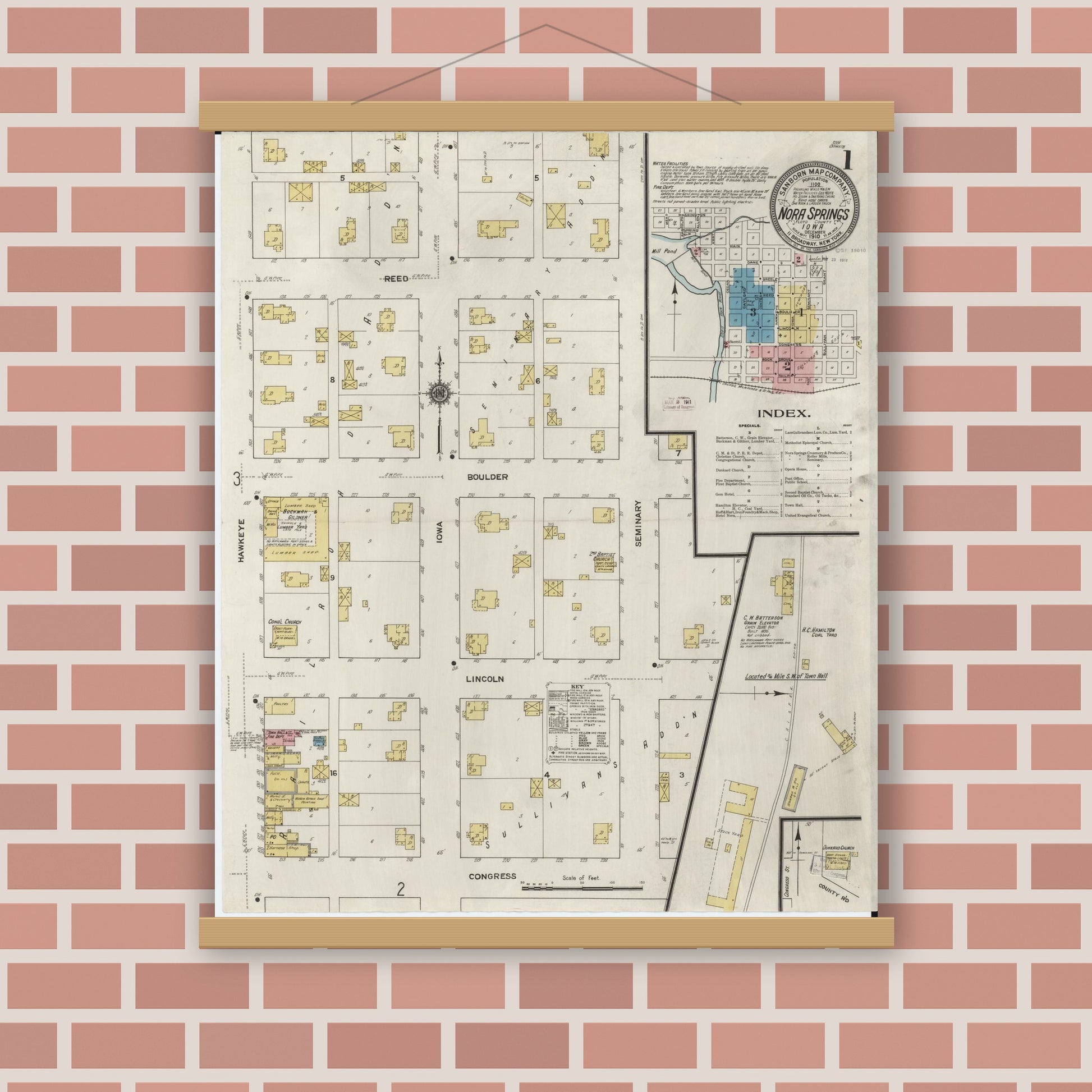 Old map wall art mockup — magnetic wood frame on brick wall — Sanborn Fire Insurance Map from Nora Springs, Floyd County, Iowa (1910) â€” Complete Set