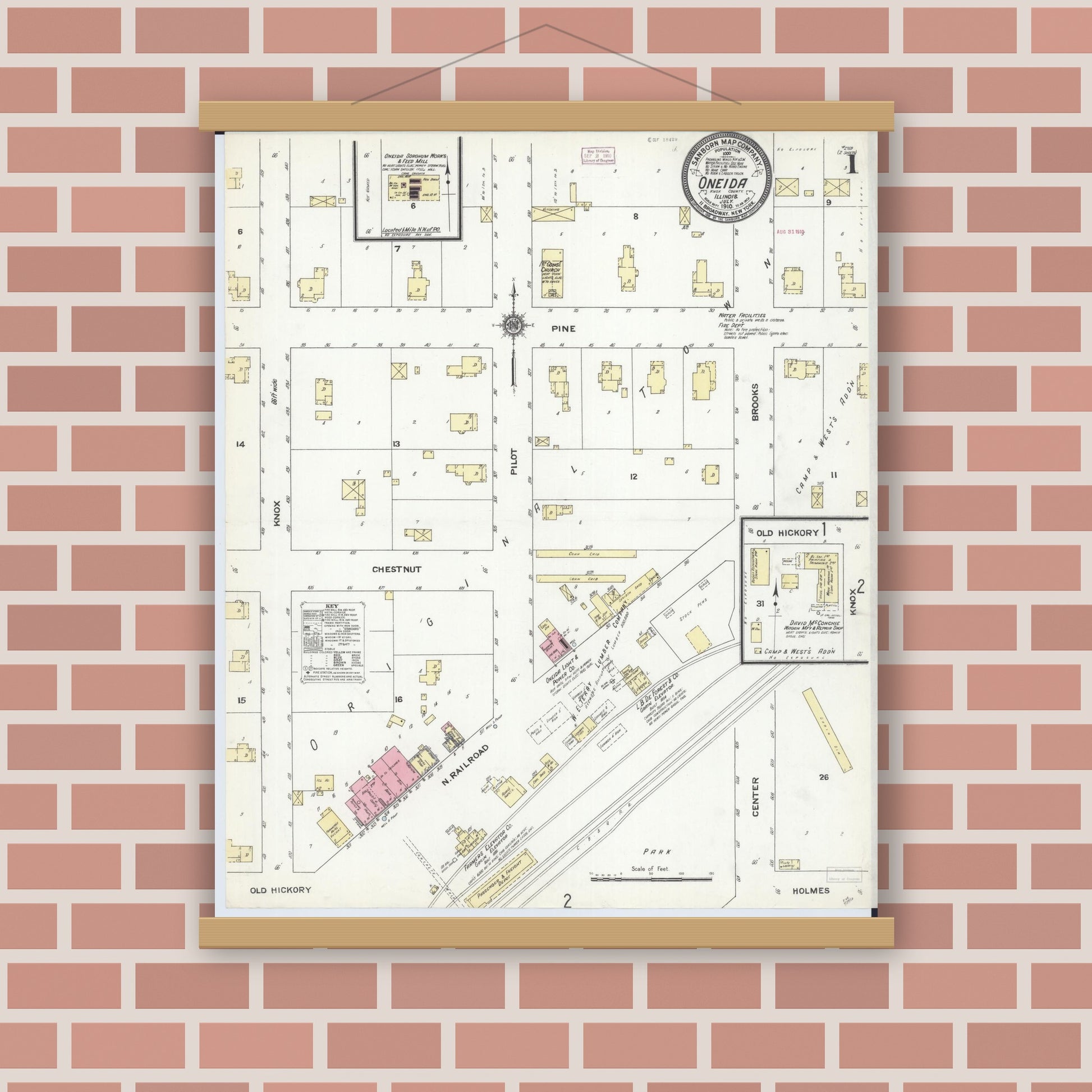 Old map wall art mockup — magnetic wood frame on brick wall — Sanborn Fire Insurance Map from Oneida, Knox County, Illinois (1910), Sheet #0001