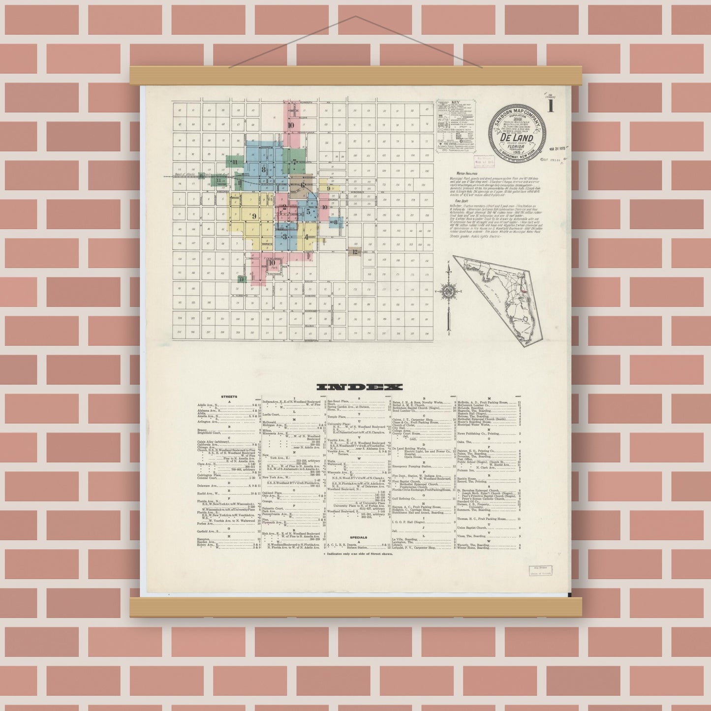 Old map wall art mockup — magnetic wood frame on brick wall — Sanborn Fire Insurance Map from De Land, Volusia County, Florida (1915) - Complete Map Set
