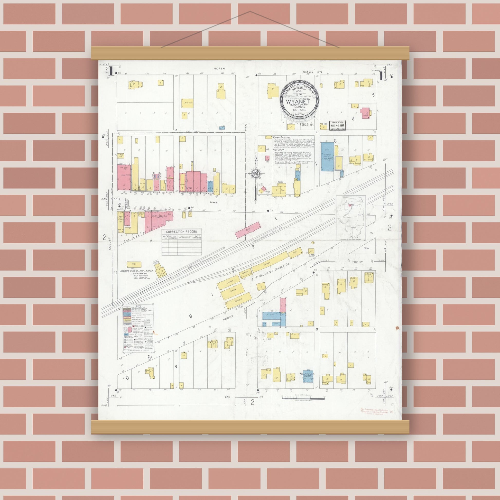Old map wall art mockup — magnetic wood frame on brick wall — Sanborn Fire Insurance Map from Wyanet, Bureau County, Illinois (1932), Sheet #0001