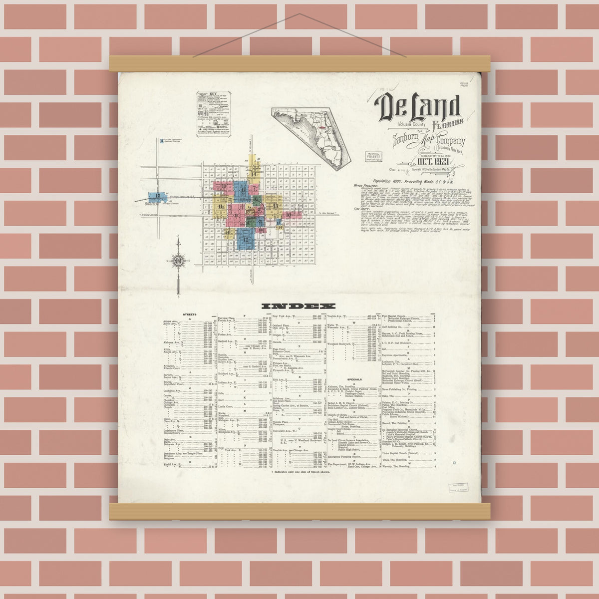 Old map wall art mockup — magnetic wood frame on brick wall — Sanborn Fire Insurance Map from De Land, Volusia County, Florida (1921), Sheet #0001