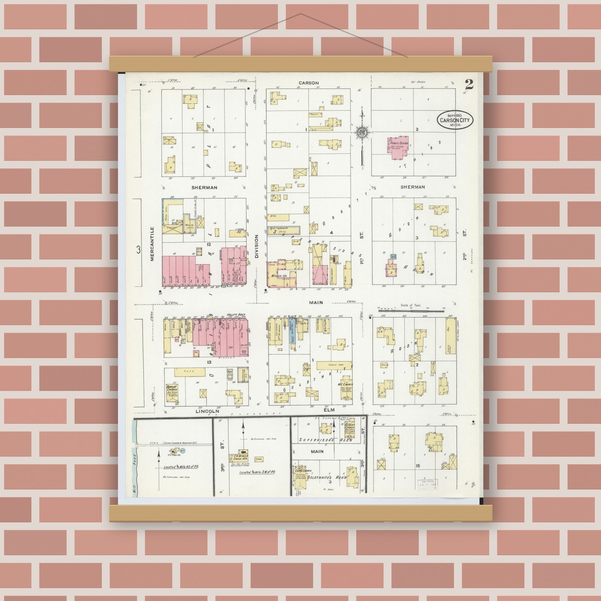 Old map wall art mockup — magnetic wood frame on brick wall — Sanborn Fire Insurance Map from Carson City, Montcalm County, Michigan (1910), Sheet #0002