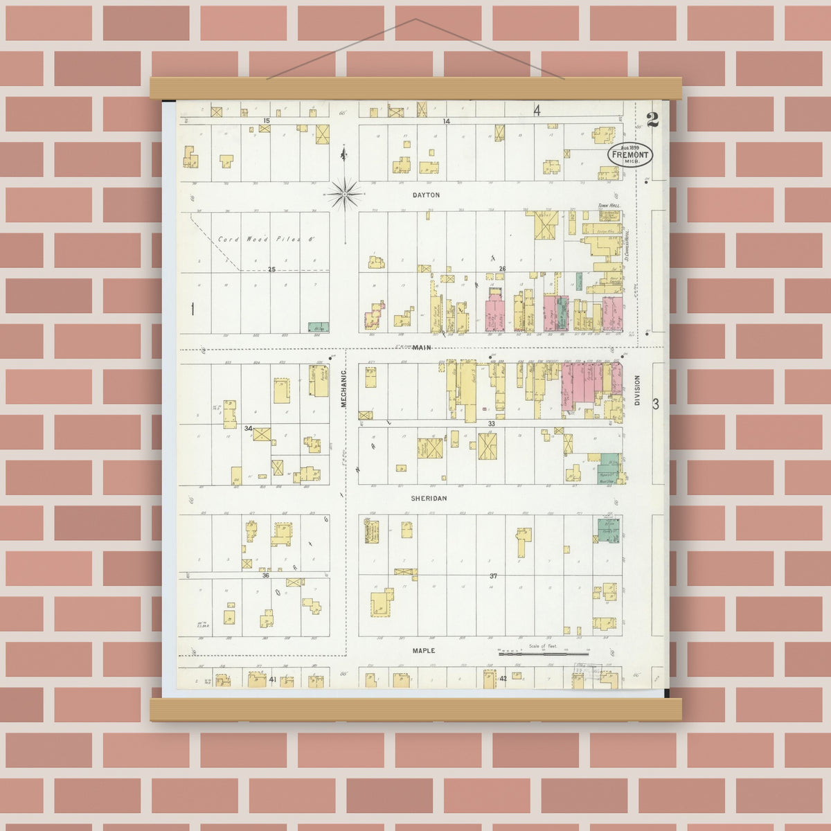 Old map wall art mockup — magnetic wood frame on brick wall — Sanborn Fire Insurance Map from Fremont, Newaygo County, Michigan (1899), Sheet #0002