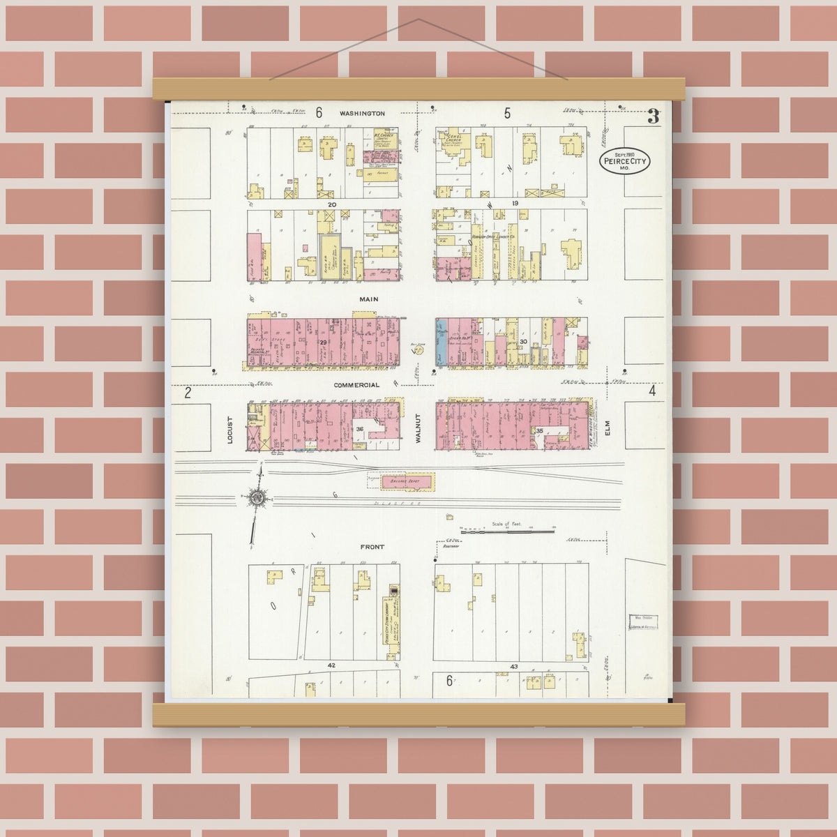 Old map wall art mockup — magnetic wood frame on brick wall — Sanborn Fire Insurance Map from Pierce City, Lawrence County, Missouri (1910), Sheet #0003