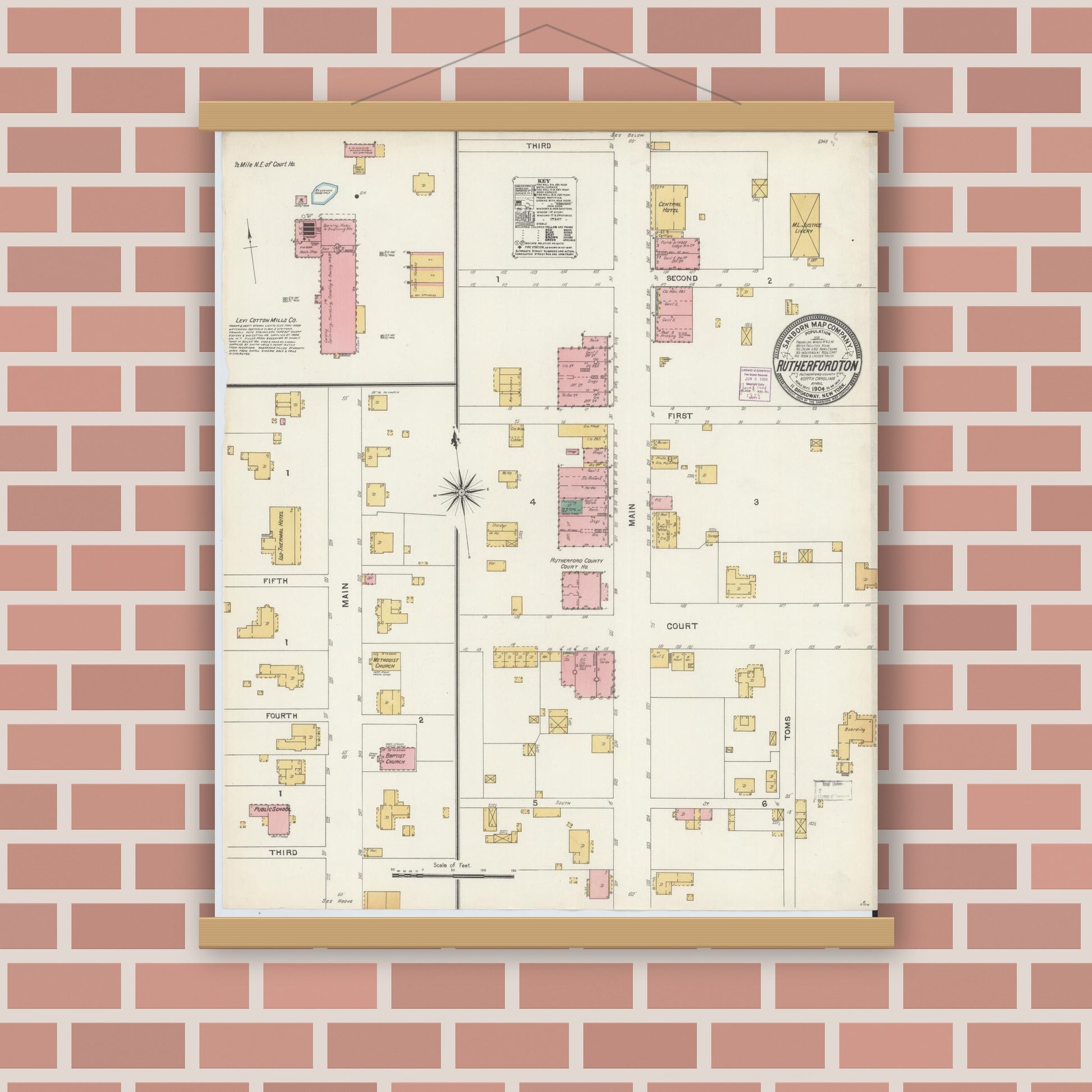 Old map wall art mockup — magnetic wood frame on brick wall — Sanborn Fire Insurance Map from Rutherfordton, Rutherford County, North Carolina (1904), Sheet #0001
