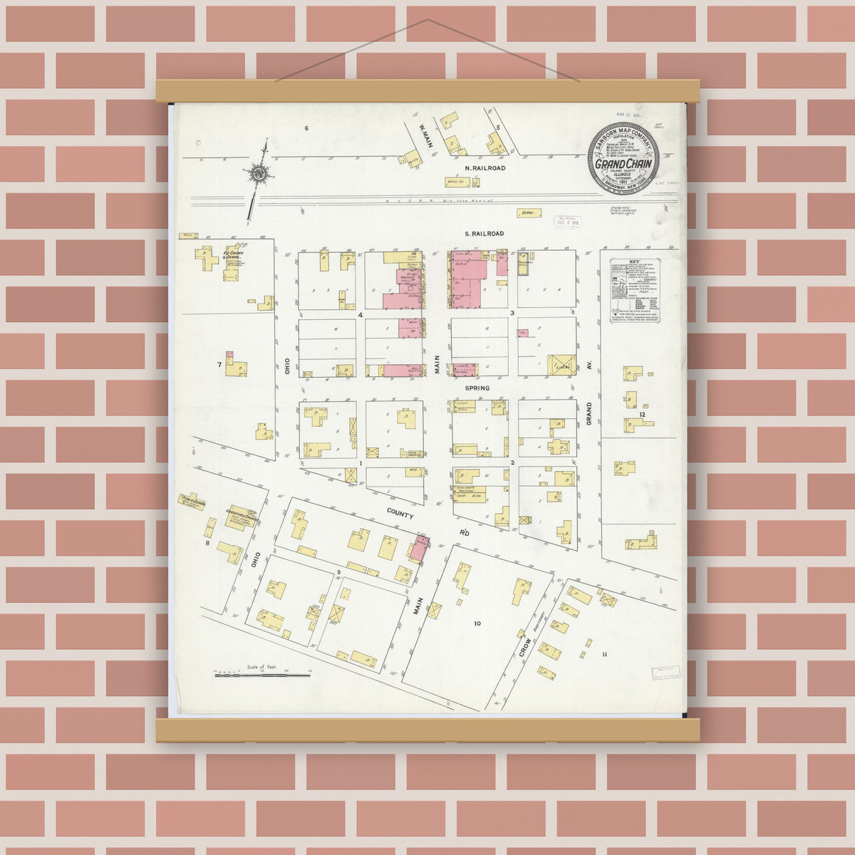 Old map wall art mockup — magnetic wood frame on brick wall — Sanborn Fire Insurance Map from Grand Chain, Pulaski County, Illinois (1911), Sheet #0001
