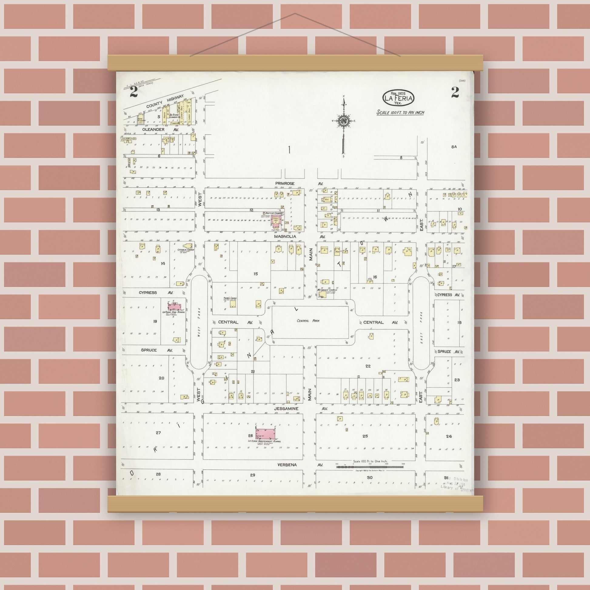 Old map wall art mockup — magnetic wood frame on brick wall — Sanborn Fire Insurance Map from La Feria, Cameron County, Texas (1925), Sheet #0002