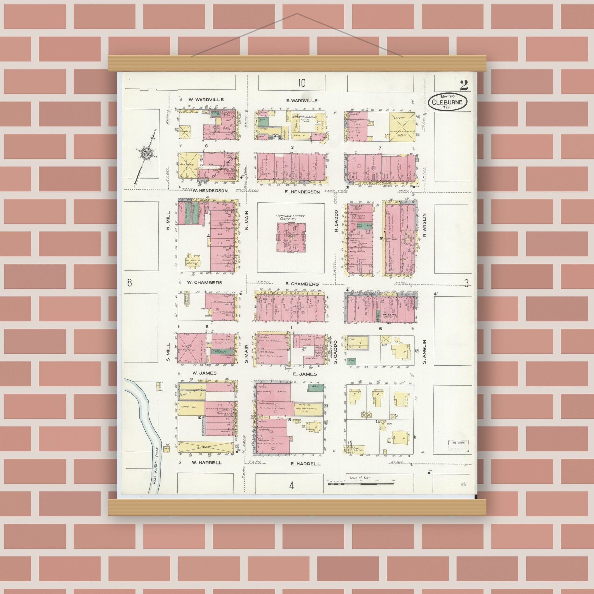 Old map wall art mockup — magnetic wood frame on brick wall — Sanborn Fire Insurance Map from Cleburne, Johnson County, Texas (1910), Sheet #0002