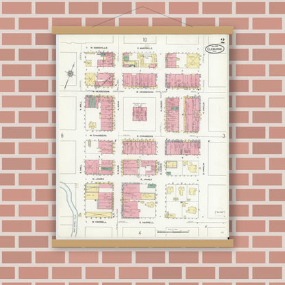 Old map wall art mockup — magnetic wood frame on brick wall — Sanborn Fire Insurance Map from Cleburne, Johnson County, Texas (1910), Sheet #0002