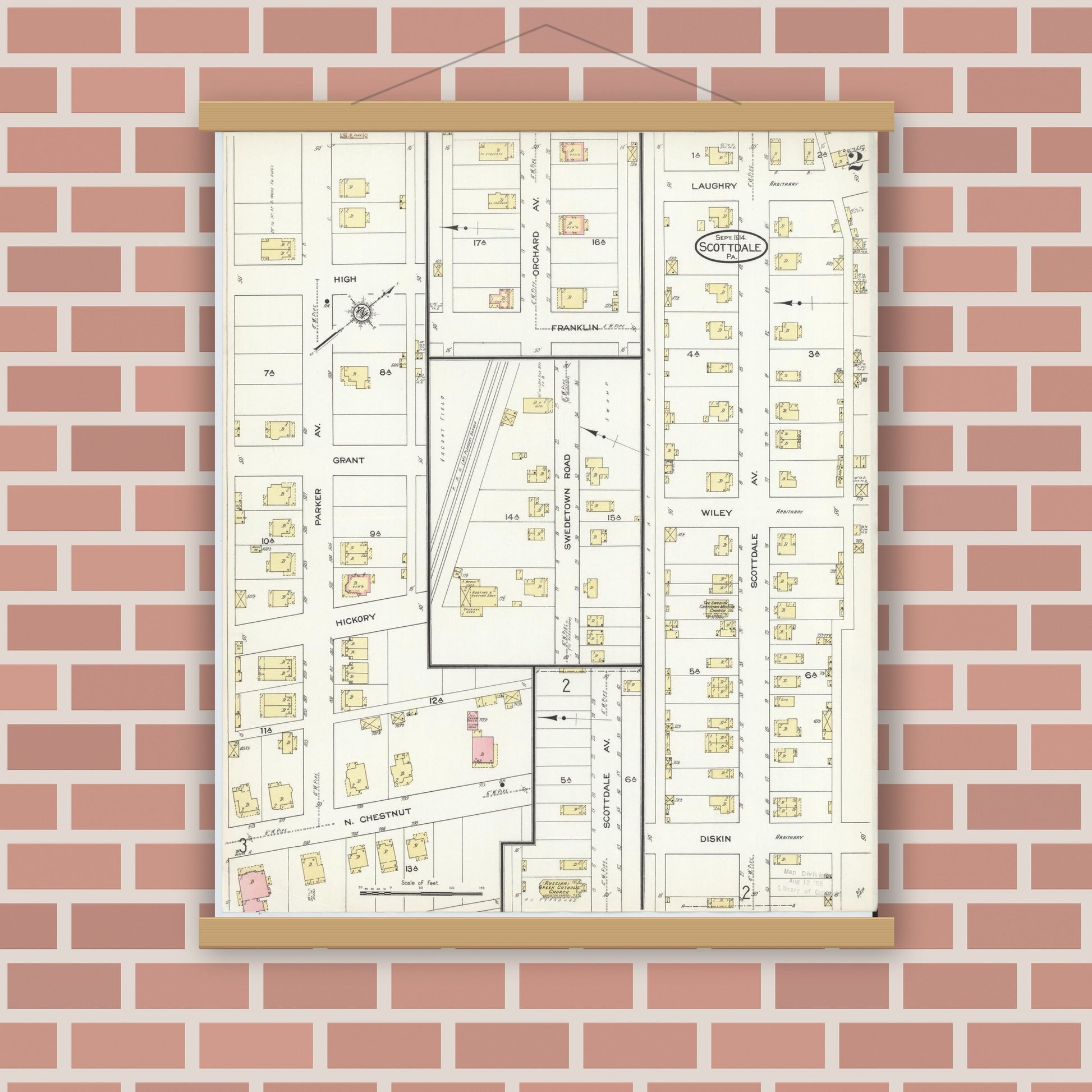 Old map wall art mockup — magnetic wood frame on brick wall — Sanborn Fire Insurance Map from Scottdale, Westmoreland County, Pennsylvania (1914), Sheet #0002