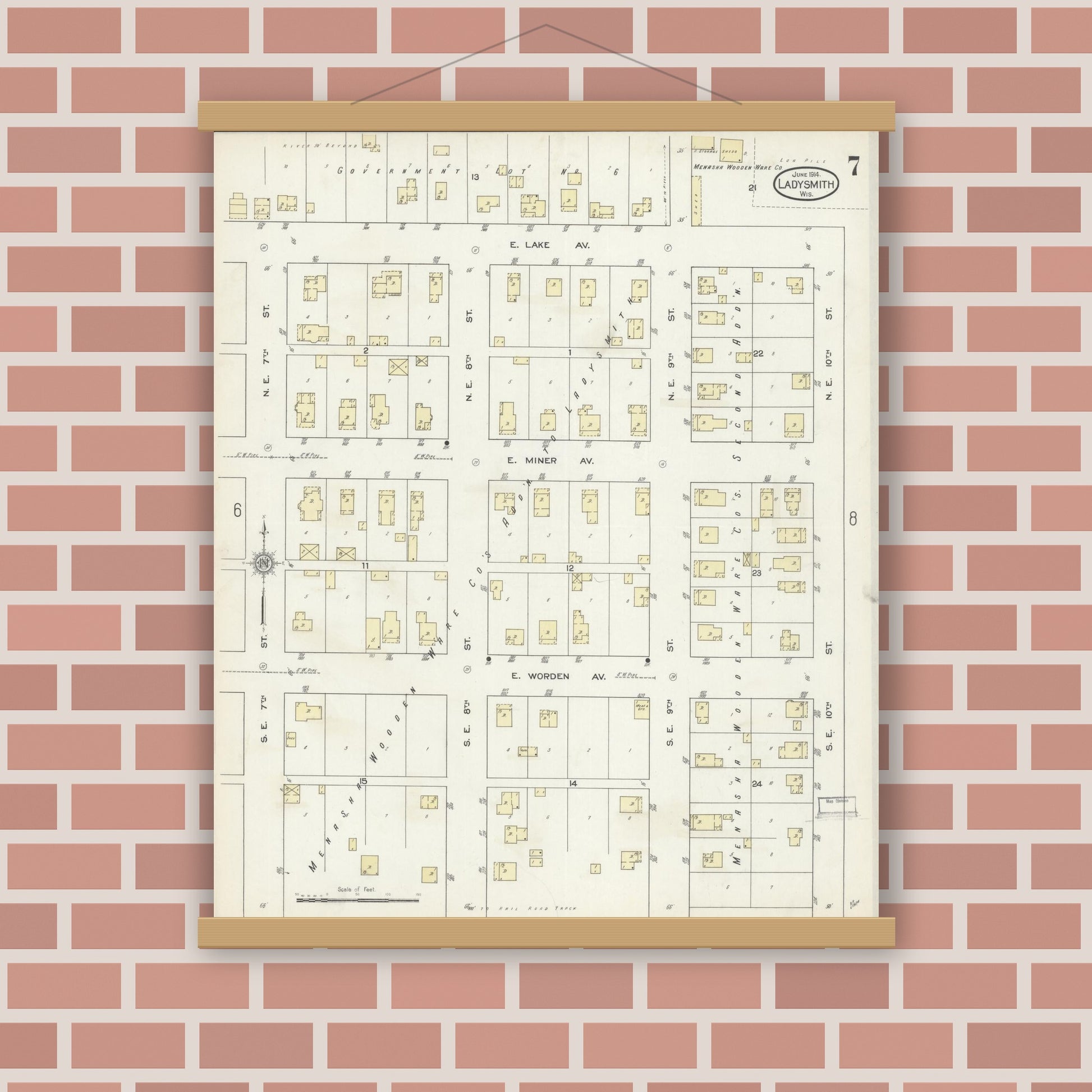 Old map wall art mockup — magnetic wood frame on brick wall — Sanborn Fire Insurance Map from Ladysmith, Rusk County, Wisconsin (1914), Sheet #0007