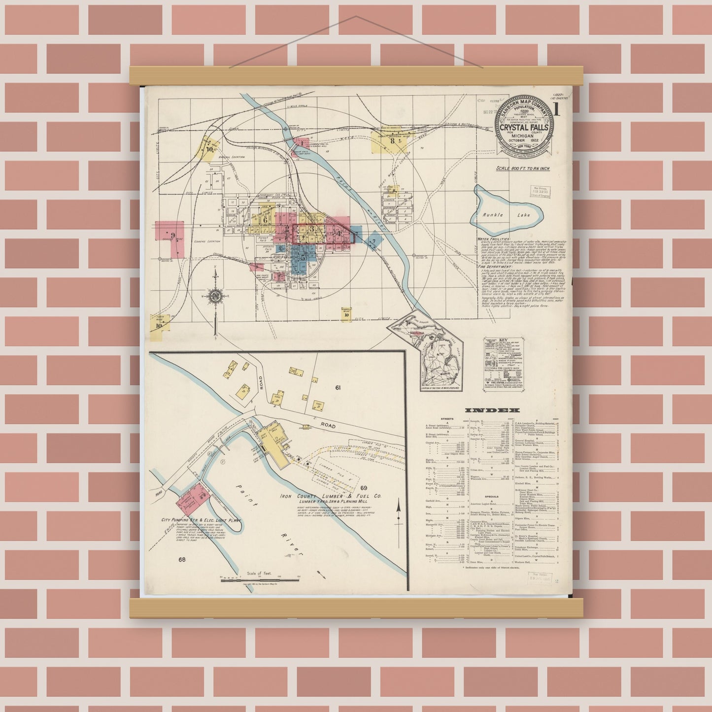 Old map wall art mockup — magnetic wood frame on brick wall — Sanborn Fire Insurance Map from Crystal Falls, Iron County, Michigan (1922) - Complete Map Set