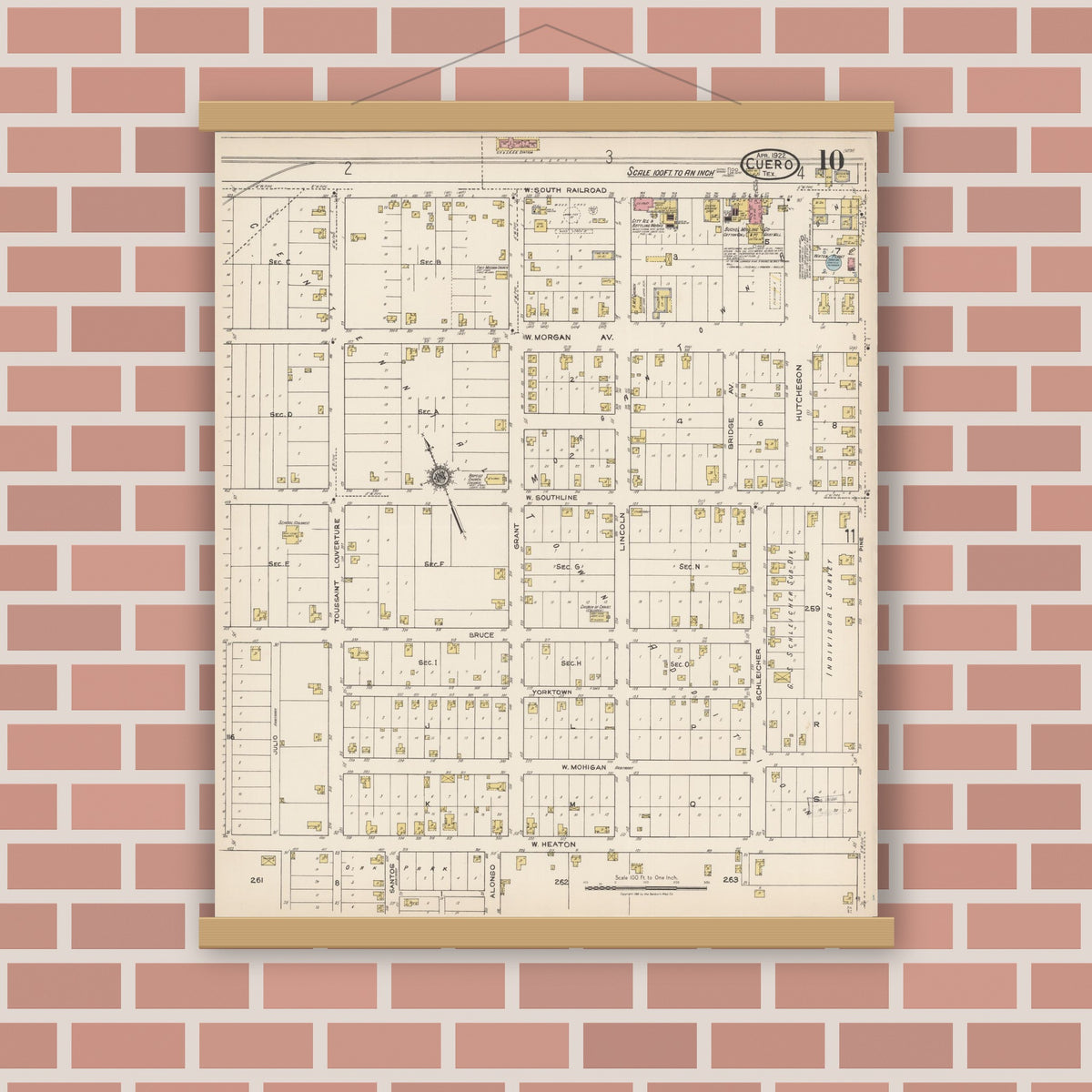 Old map wall art mockup — magnetic wood frame on brick wall — Sanborn Fire Insurance Map from Cuero, De Witt County, Texas (1922), Sheet #0010