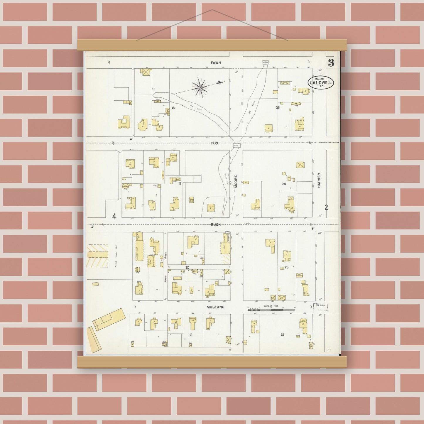 Old map wall art mockup — magnetic wood frame on brick wall — Sanborn Fire Insurance Map from Caldwell, Burleson County, Texas (1901), Sheet #0003