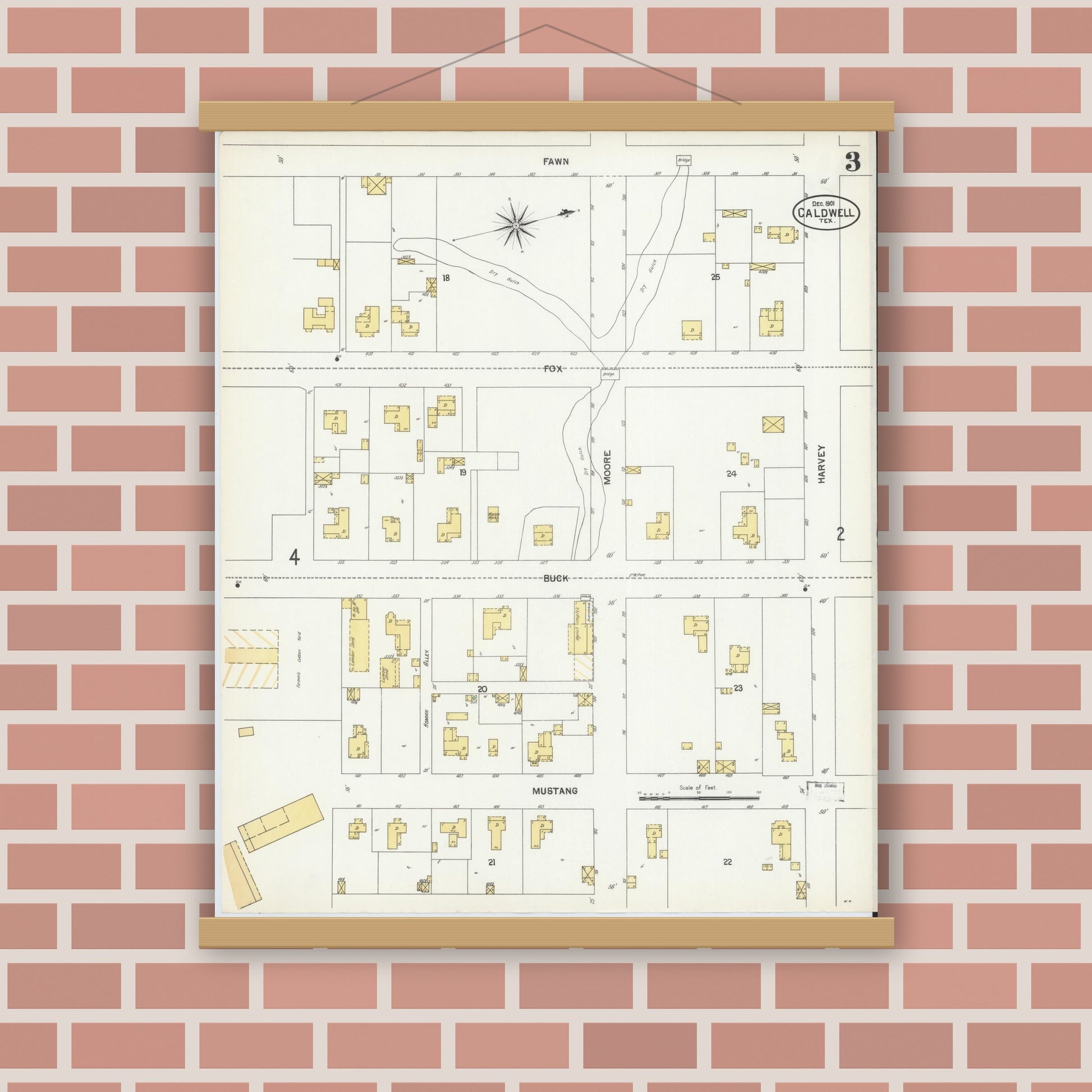 Old map wall art mockup — magnetic wood frame on brick wall — Sanborn Fire Insurance Map from Caldwell, Burleson County, Texas (1901), Sheet #0003