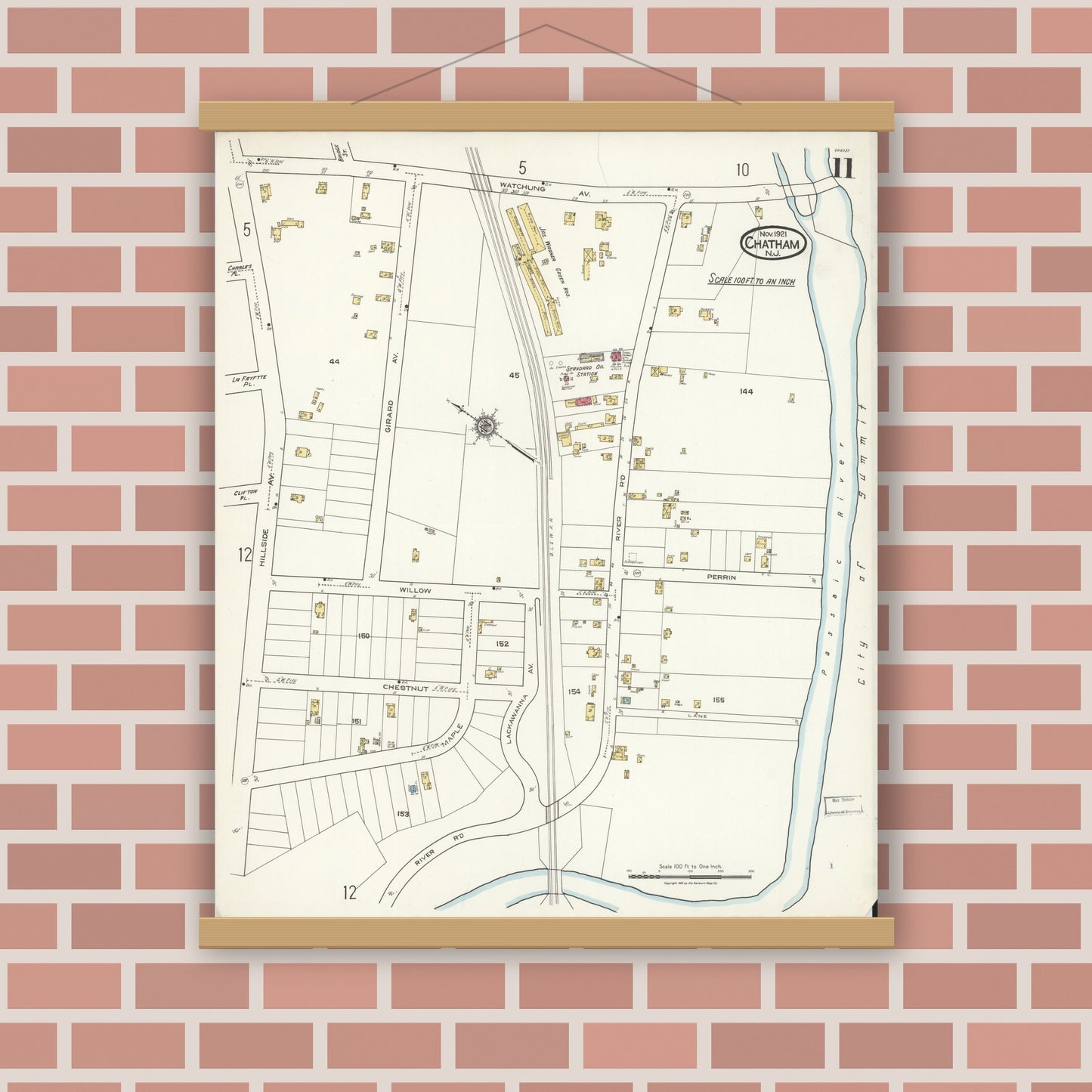 Old map wall art mockup — magnetic wood frame on brick wall — Sanborn Fire Insurance Map from Chatham, Morris County, New Jersey (1921), Sheet #0011