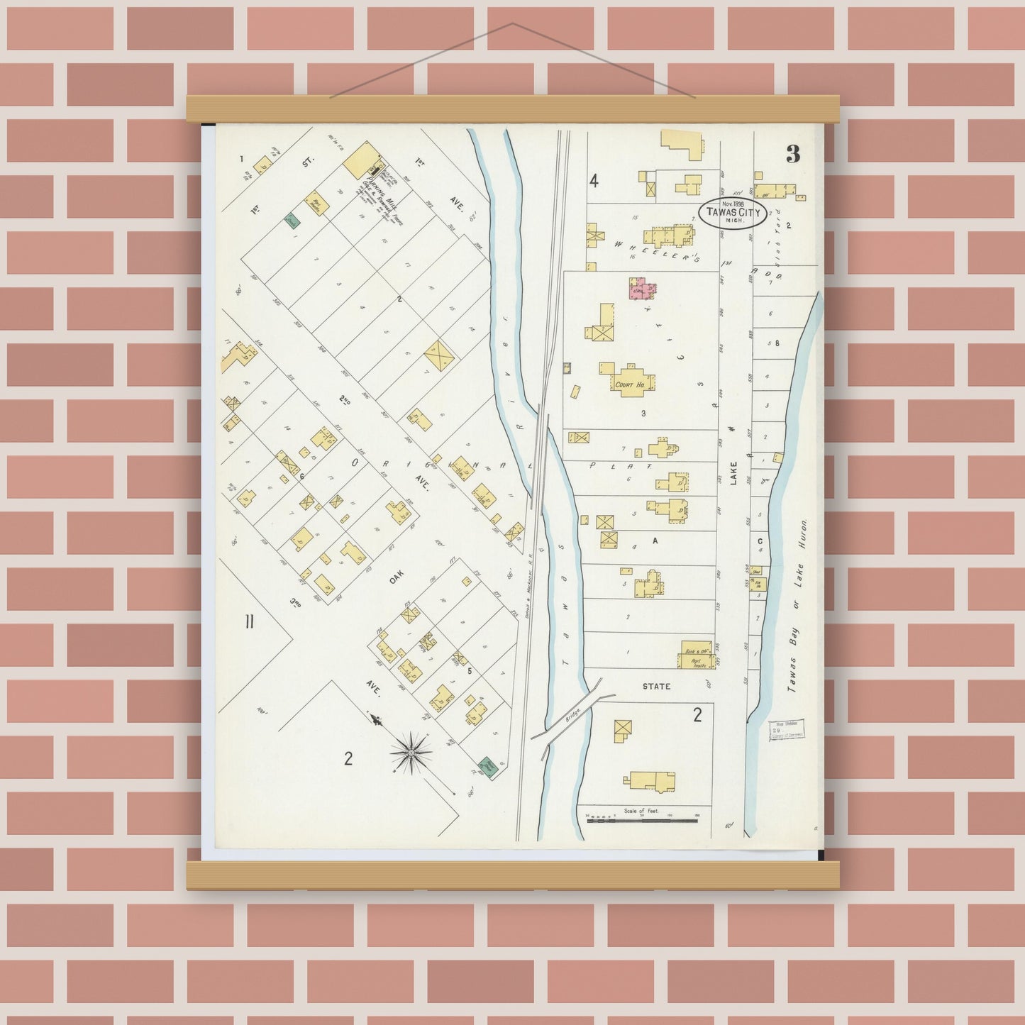 Old map wall art mockup — magnetic wood frame on brick wall — Sanborn Fire Insurance Map from Tawas City, Iosco County, Michigan (1898), Sheet #0003
