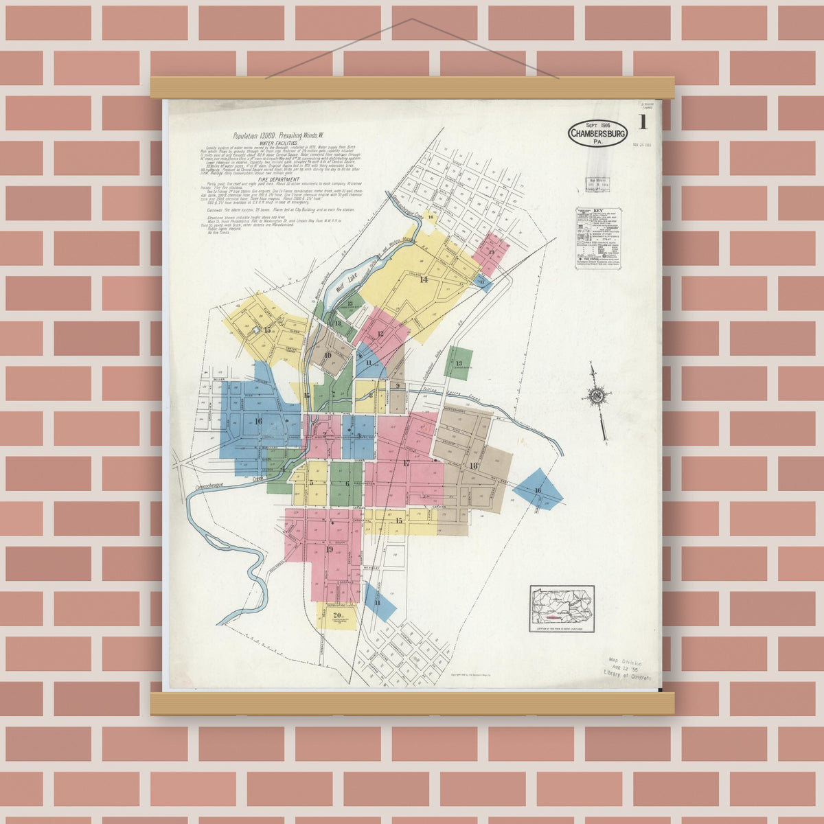 Old map wall art mockup — magnetic wood frame on brick wall — Sanborn Fire Insurance Map from Chambersburg, Franklin County, Pennsylvania (1916), Sheet #0001