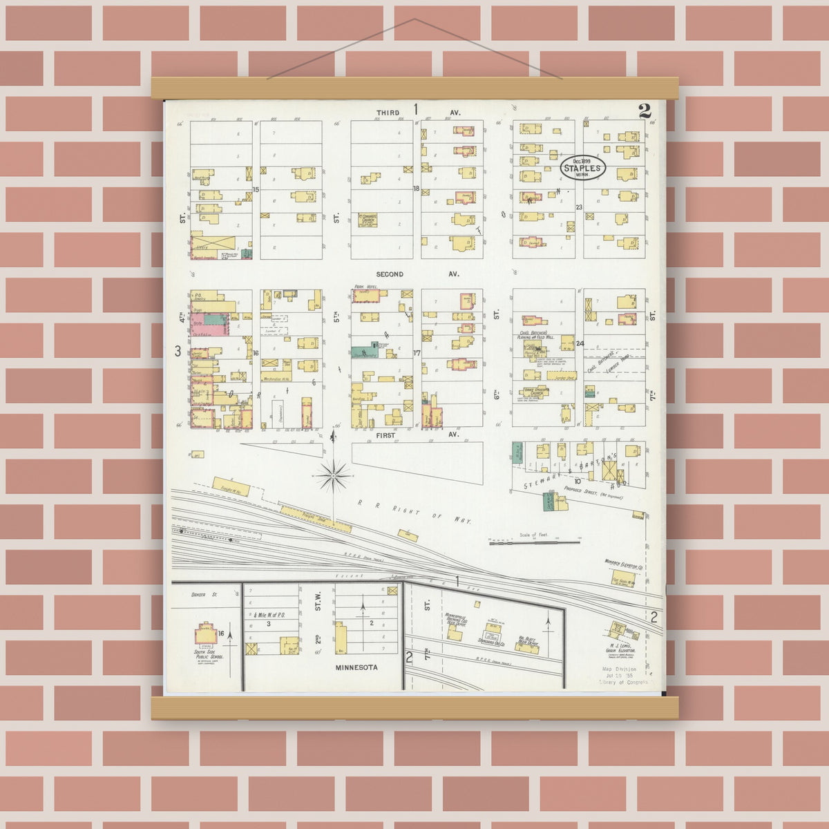 Old map wall art mockup — magnetic wood frame on brick wall — Sanborn Fire Insurance Map from Staples, Todd County, Minnesota (1899), Sheet #0002