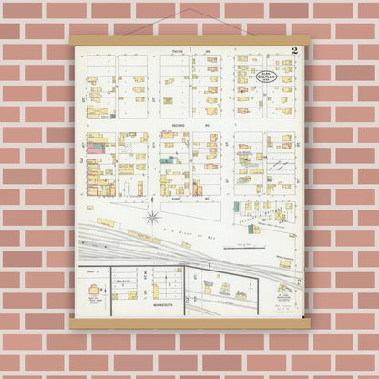 Old map wall art mockup — magnetic wood frame on brick wall — Sanborn Fire Insurance Map from Staples, Todd County, Minnesota (1899), Sheet #0002