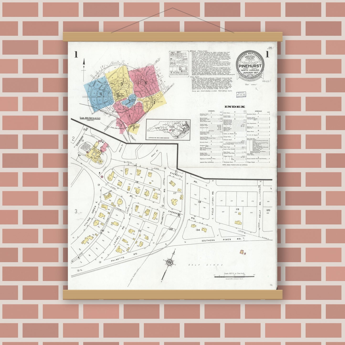 Old map wall art mockup — magnetic wood frame on brick wall — Sanborn Fire Insurance Map from Pinehurst, Moore County, North Carolina (1927), Sheet #0001