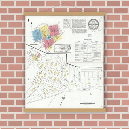 Old map wall art mockup — magnetic wood frame on brick wall — Sanborn Fire Insurance Map from Pinehurst, Moore County, North Carolina (1927), Sheet #0001