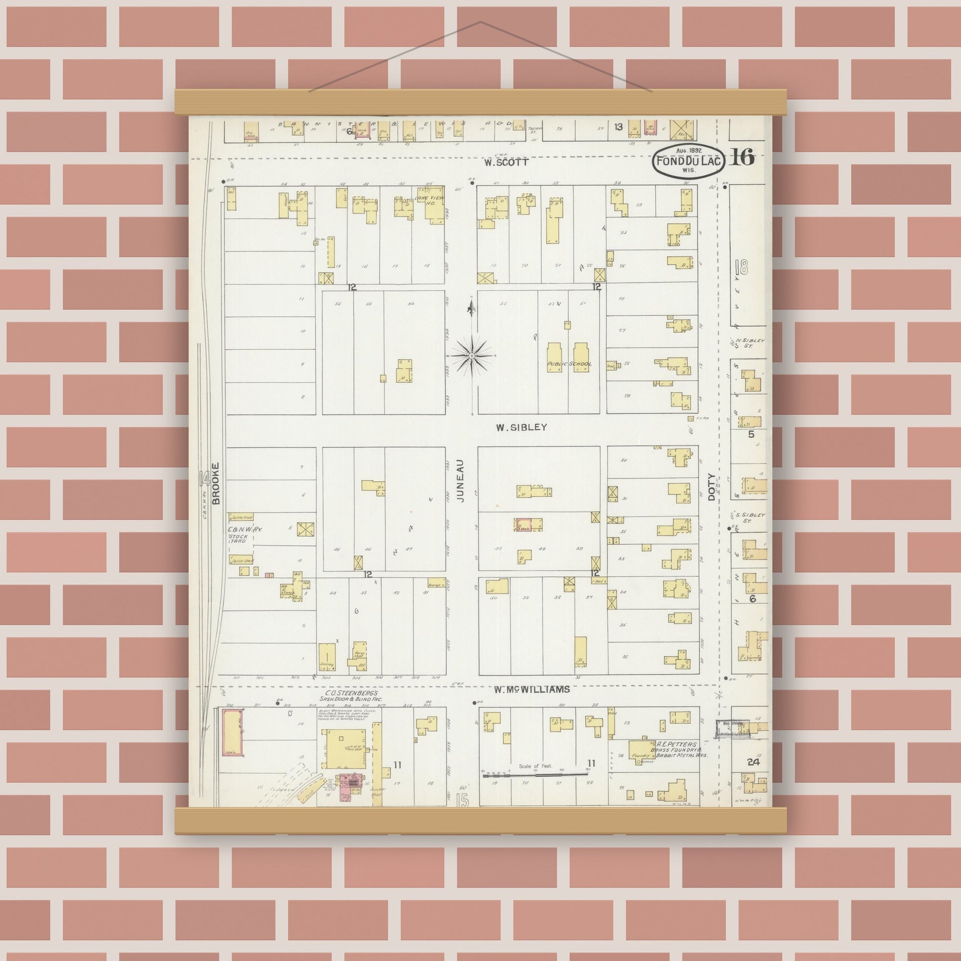 Old map wall art mockup — magnetic wood frame on brick wall — Sanborn Fire Insurance Map from Fond du Lac, Fond du Lac County, Wisconsin (1892), Sheet #0016