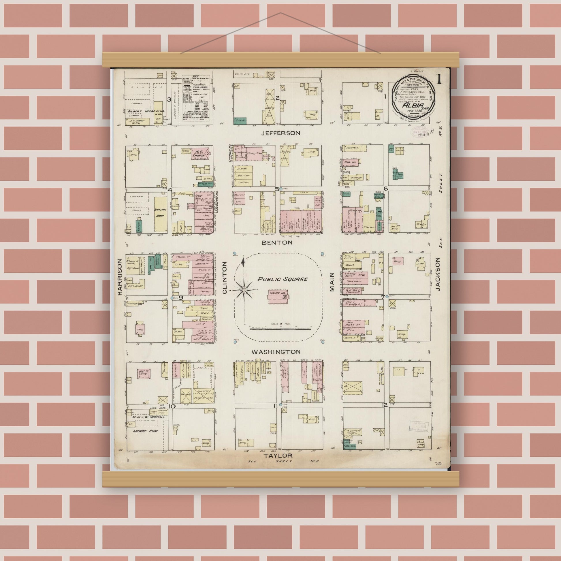 Old map wall art mockup — magnetic wood frame on brick wall — Sanborn Fire Insurance Map from Albia, Monroe County, Iowa (1886), Sheet #0001