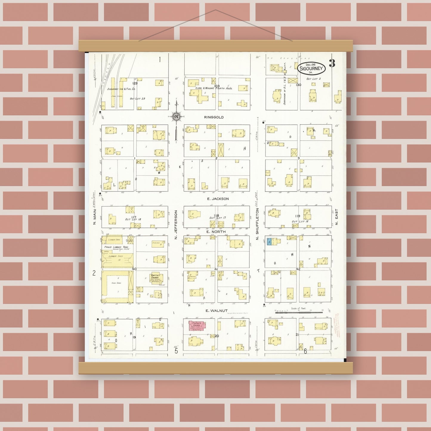 Old map wall art mockup — magnetic wood frame on brick wall — Sanborn Fire Insurance Map from Sigourney, Kiokuk County, Iowa (1916), Sheet #0003