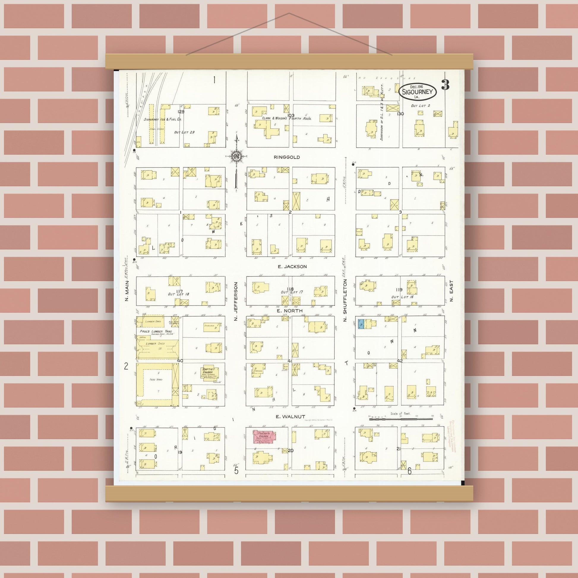 Old map wall art mockup — magnetic wood frame on brick wall — Sanborn Fire Insurance Map from Sigourney, Kiokuk County, Iowa (1916), Sheet #0003