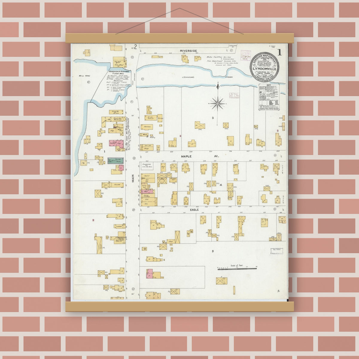 Old map wall art mockup — magnetic wood frame on brick wall — Sanborn Fire Insurance Map from Lyndonville, Orleans County, New York (1906) - Complete Map Set