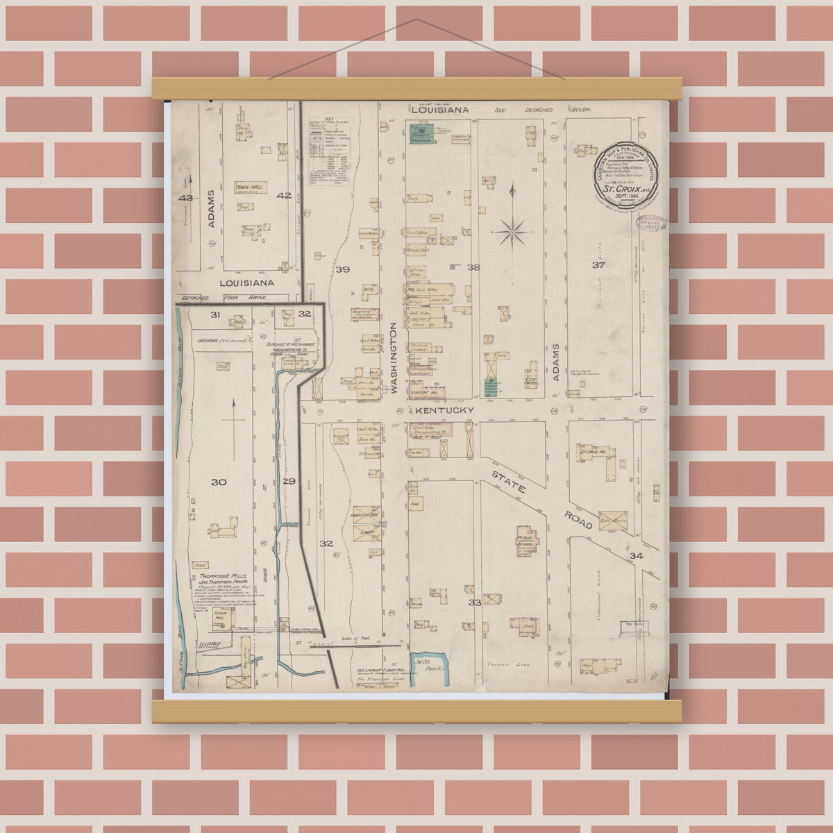 Old map wall art mockup — magnetic wood frame on brick wall — Sanborn Fire Insurance Map from Saint Croix Falls, Polk County, Wisconsin (1885), Sheet #0001
