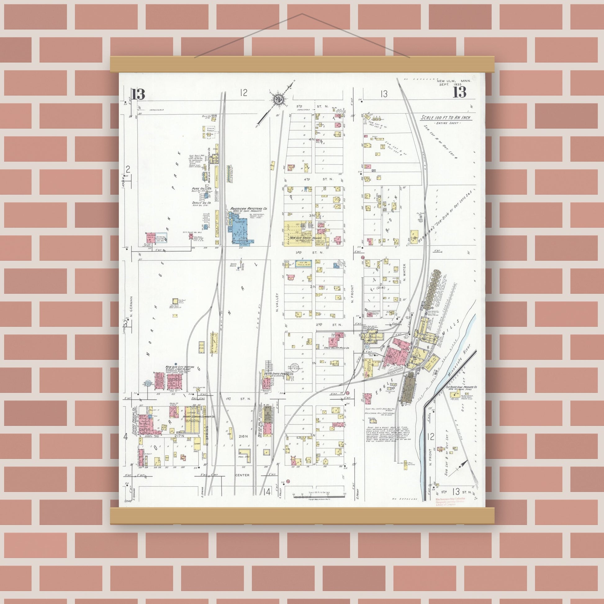 Old map wall art mockup — magnetic wood frame on brick wall — Sanborn Fire Insurance Map from New Ulm, Brown County, Minnesota (1935), Sheet #0013