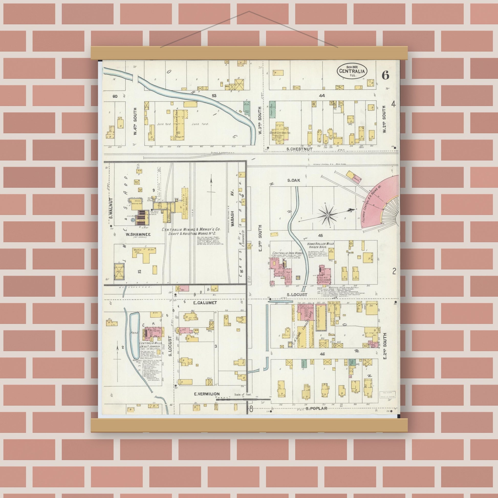 Old map wall art mockup — magnetic wood frame on brick wall — Sanborn Fire Insurance Map from Centralia, Marion, Clinton, Jefferson, and Washington Counties, Illinois (1902), Sheet #0006