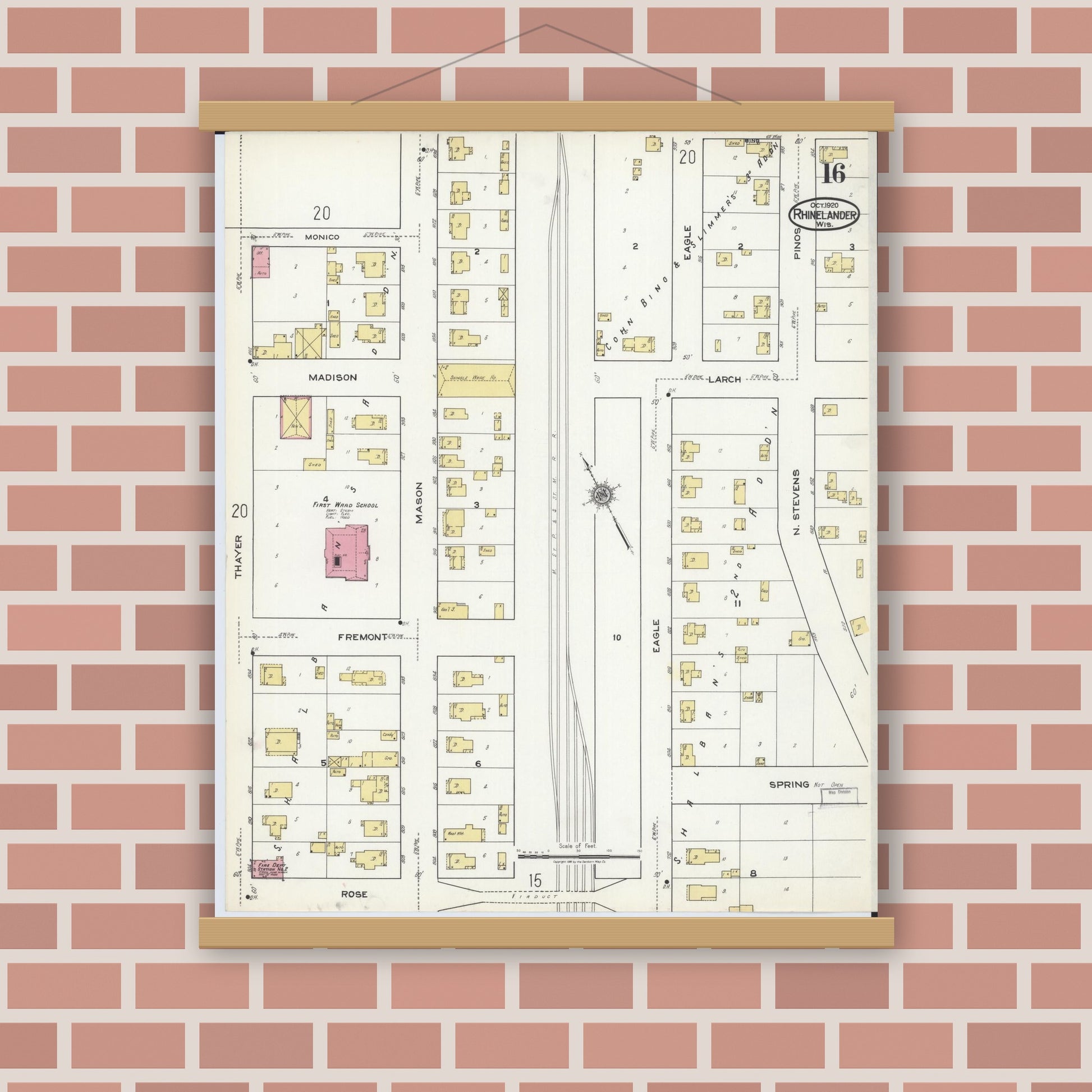 Old map wall art mockup — magnetic wood frame on brick wall — Sanborn Fire Insurance Map from Rhinelander, Oneida County, Wisconsin (1920), Sheet #0016