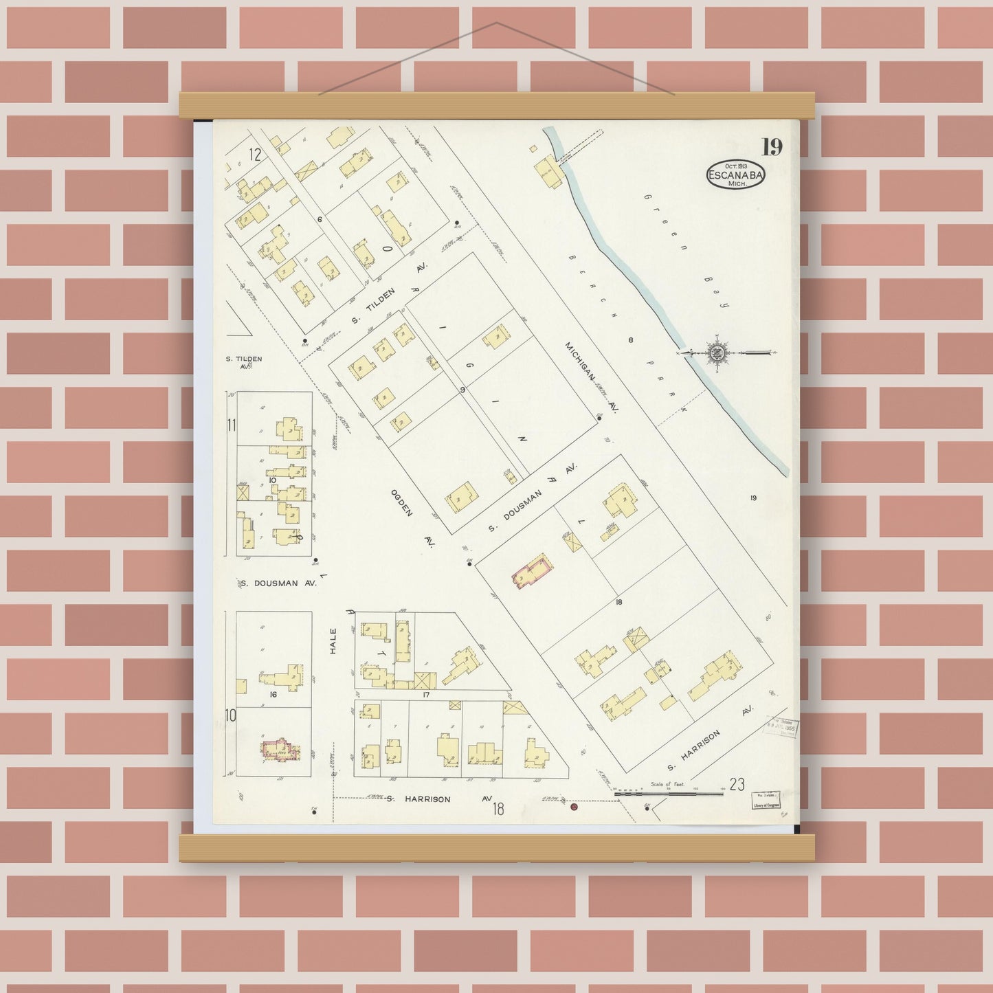 Old map wall art mockup — magnetic wood frame on brick wall — Sanborn Fire Insurance Map from Escanaba, Delta County, Michigan (1913), Sheet #0019