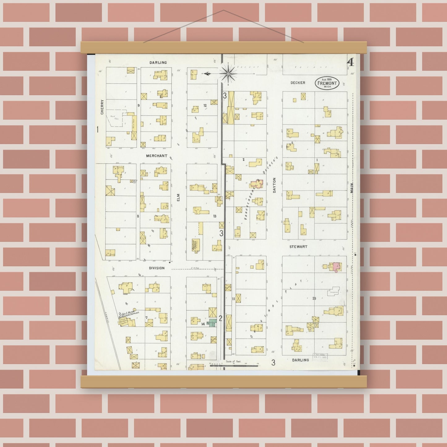 Old map wall art mockup — magnetic wood frame on brick wall — Sanborn Fire Insurance Map from Fremont, Newaygo County, Michigan (1899), Sheet #0004