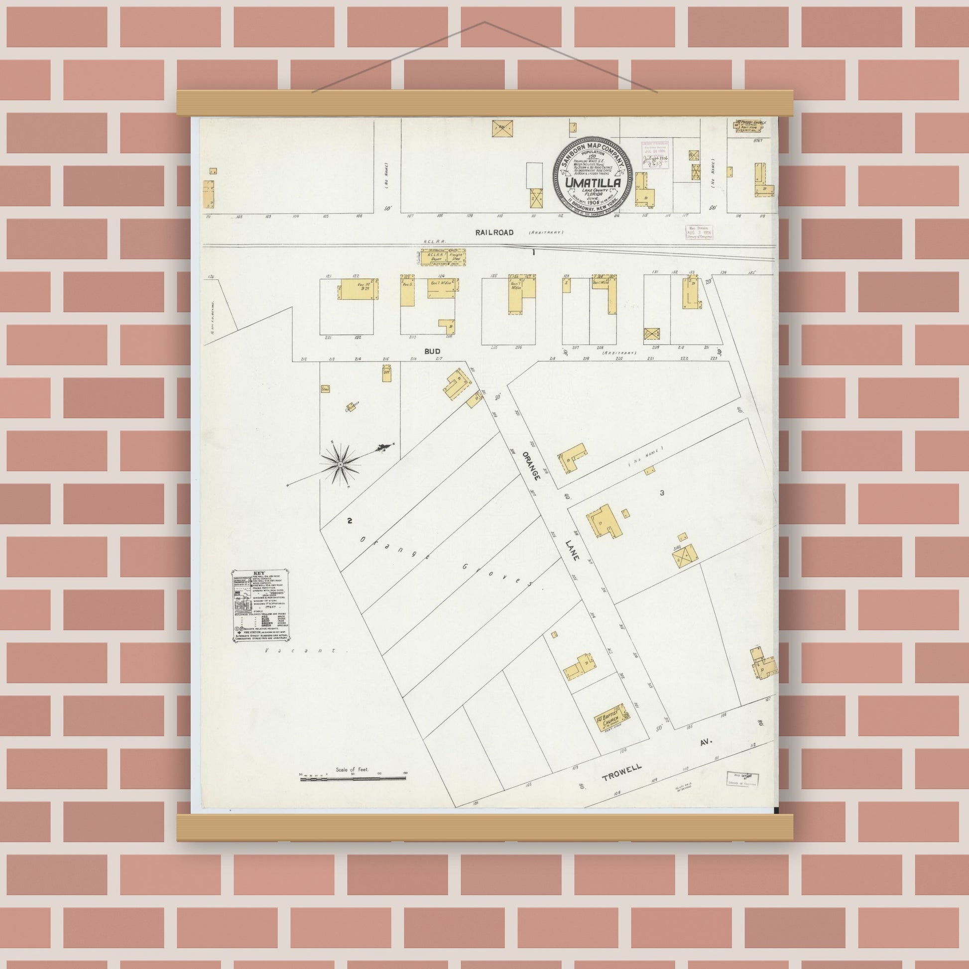 Old map wall art mockup — magnetic wood frame on brick wall — Sanborn Fire Insurance Map from Umatilla, Lake County, Florida (1906), Sheet #0001