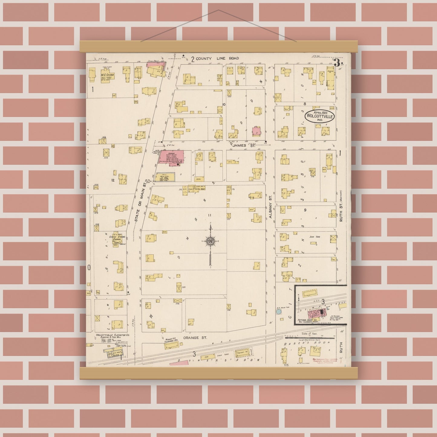 Old map wall art mockup — magnetic wood frame on brick wall — Sanborn Fire Insurance Map from Wolcottville, Noble And LaGrange Counties, Indiana (1922), Sheet #0003