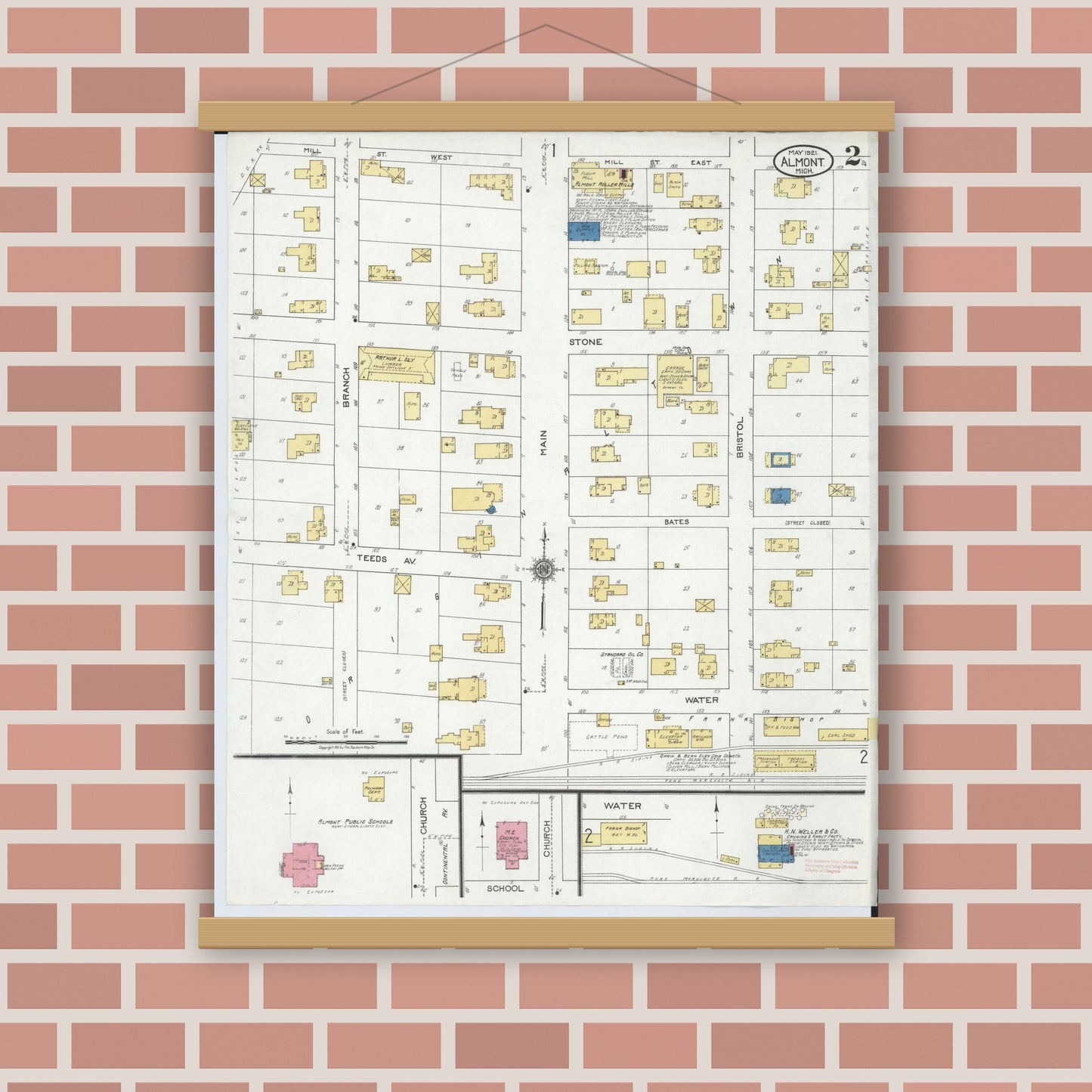 Old map wall art mockup — magnetic wood frame on brick wall — Sanborn Fire Insurance Map from Almont, Lapeer County, Michigan (1921), Sheet #0002