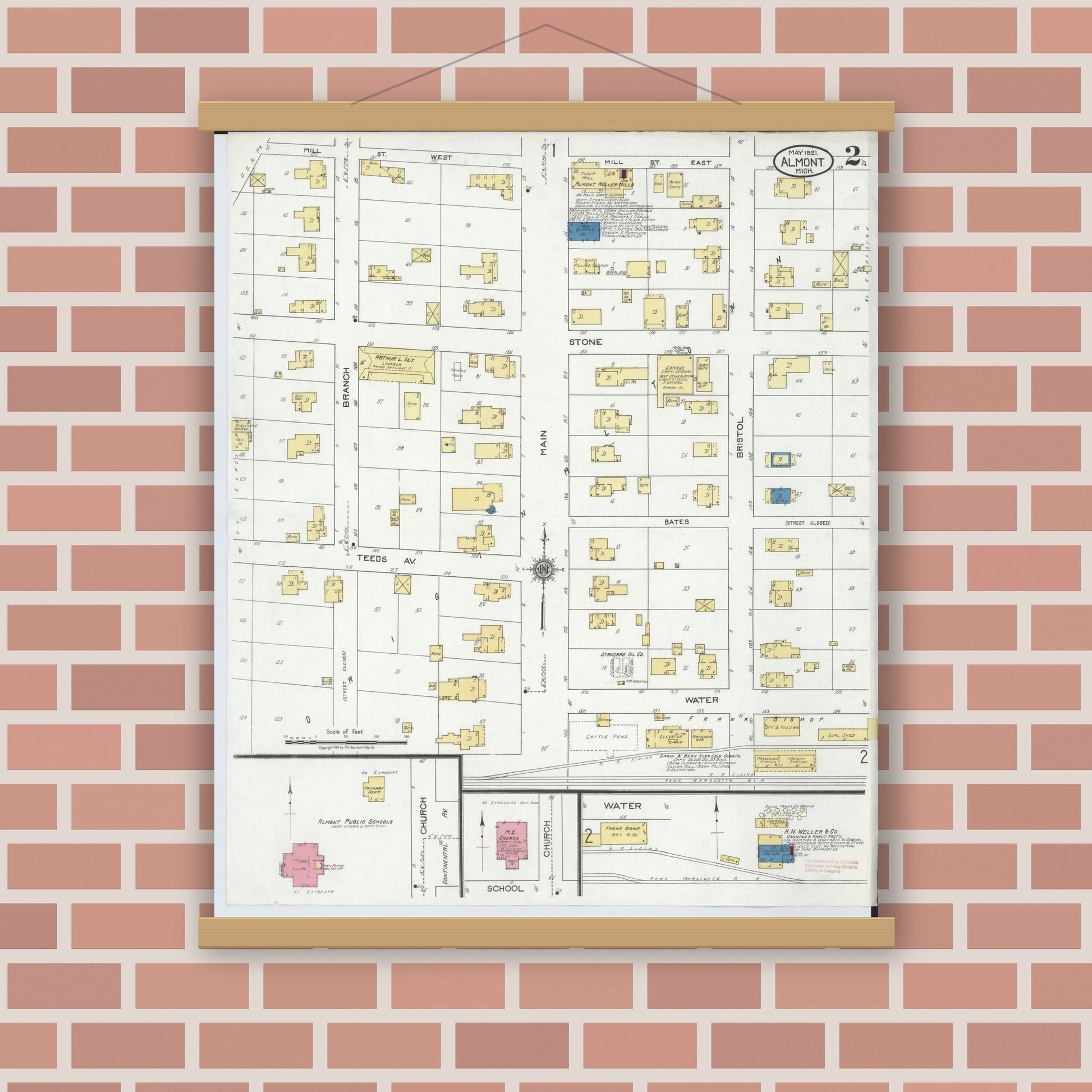 Old map wall art mockup — magnetic wood frame on brick wall — Sanborn Fire Insurance Map from Almont, Lapeer County, Michigan (1921), Sheet #0002